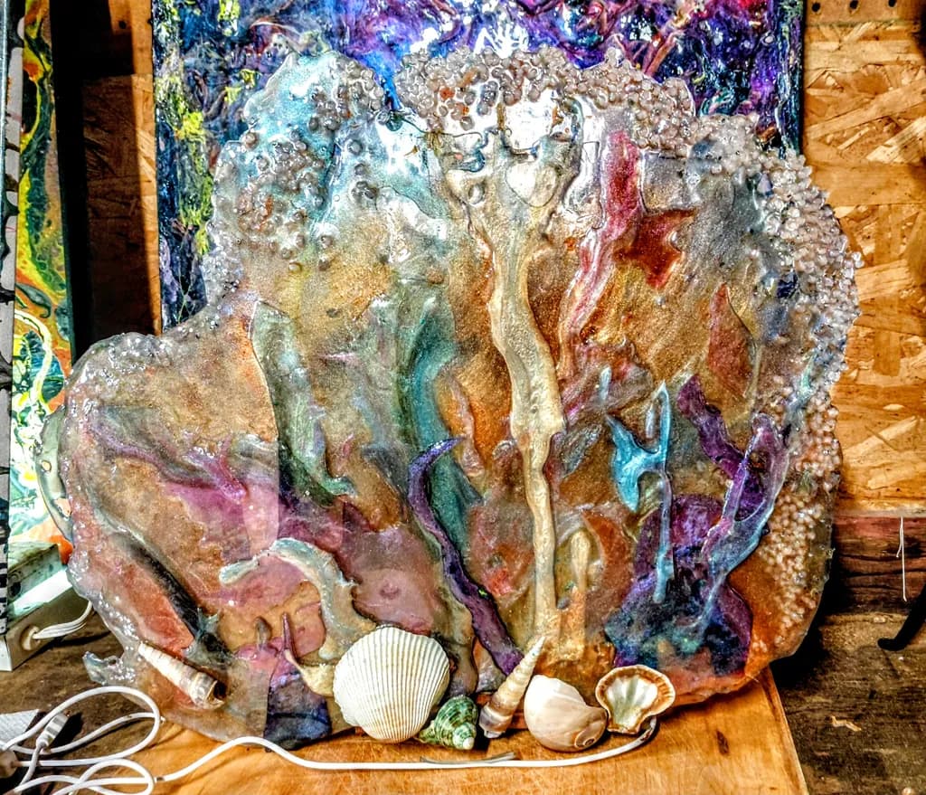 Oceanic Dreams: A Vibrant Coastal Sculpture with Shell Accents