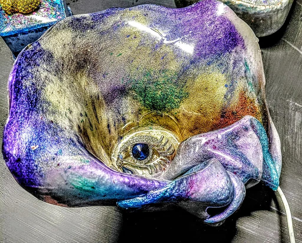 Whimsical Eye: A Colorful Abstract Floral Bowl with Unique Textures and Sparkling Hues