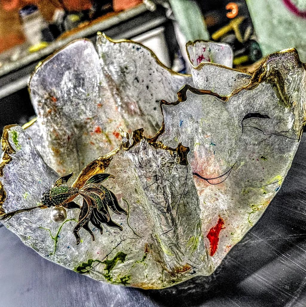Whispers of Color: An Intricate Translucent Bowl with Golden Accents
