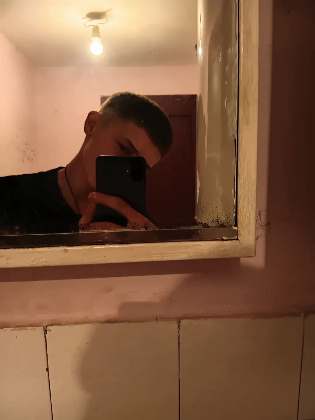 Reflections of Self: A Portrait in the Mirror's Light