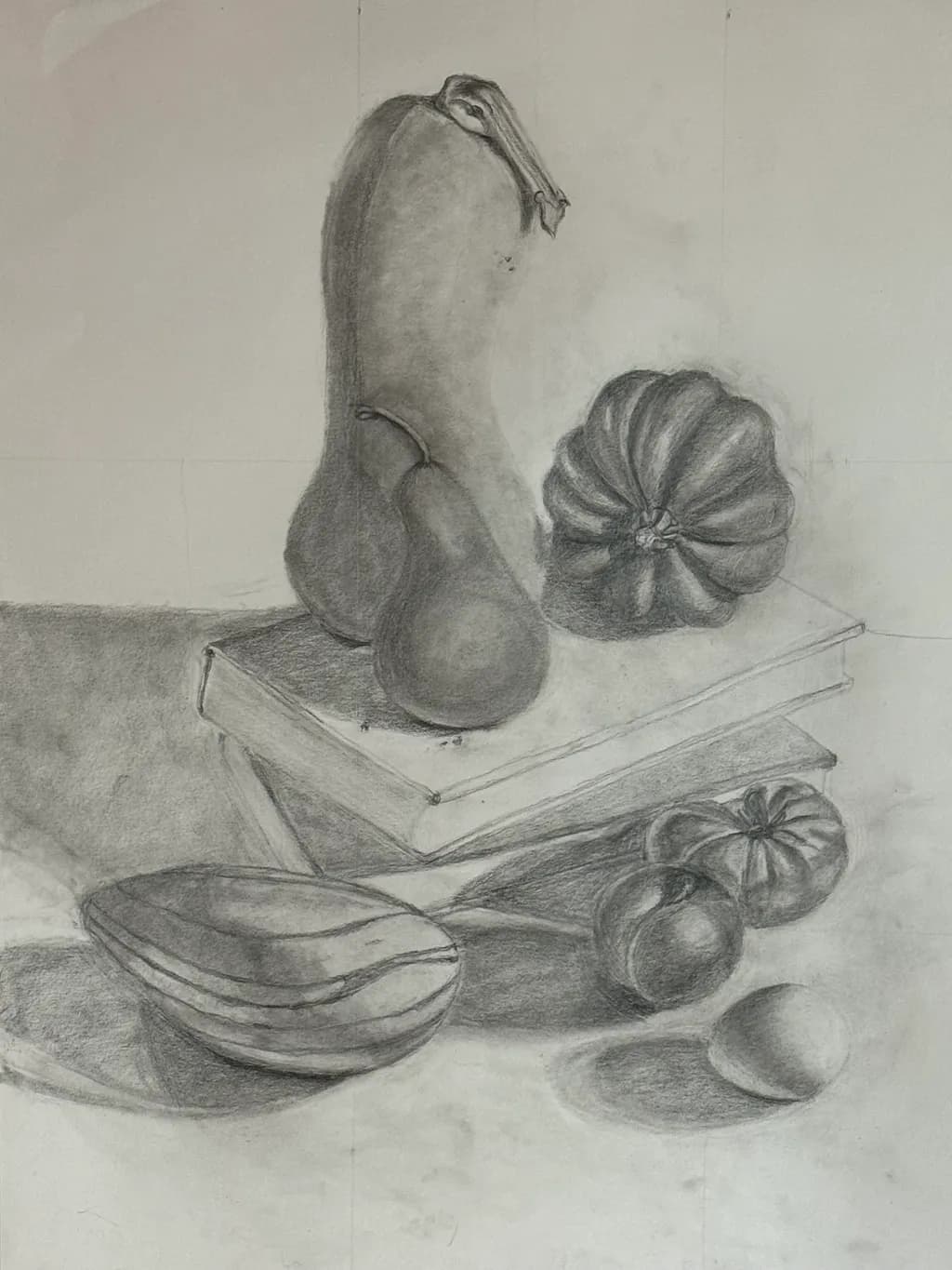 Whispers of Nature: A Charcoal Still Life of Fruits and Books