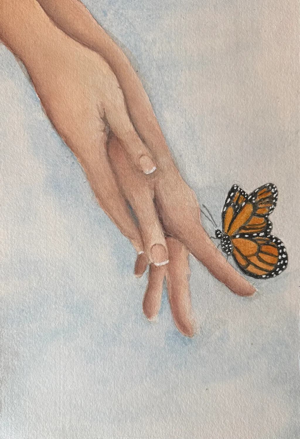 Whispers of Connection: A Delicate Dance Between Hands and a Butterfly