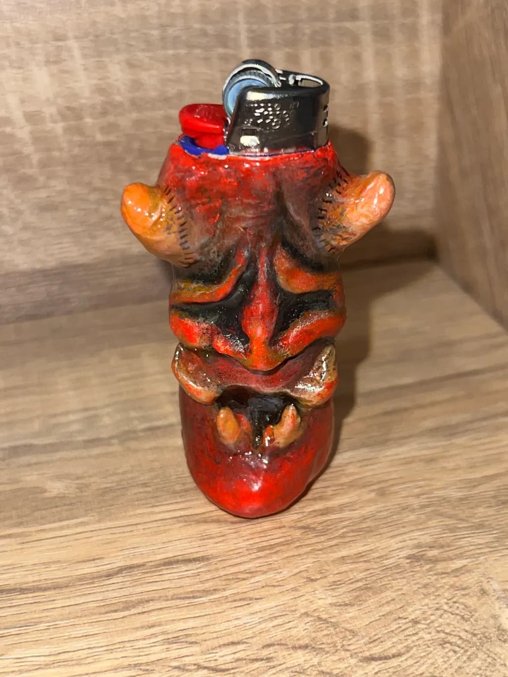 Demonic Flame: Unique Red Decorative Lighter Sculpture