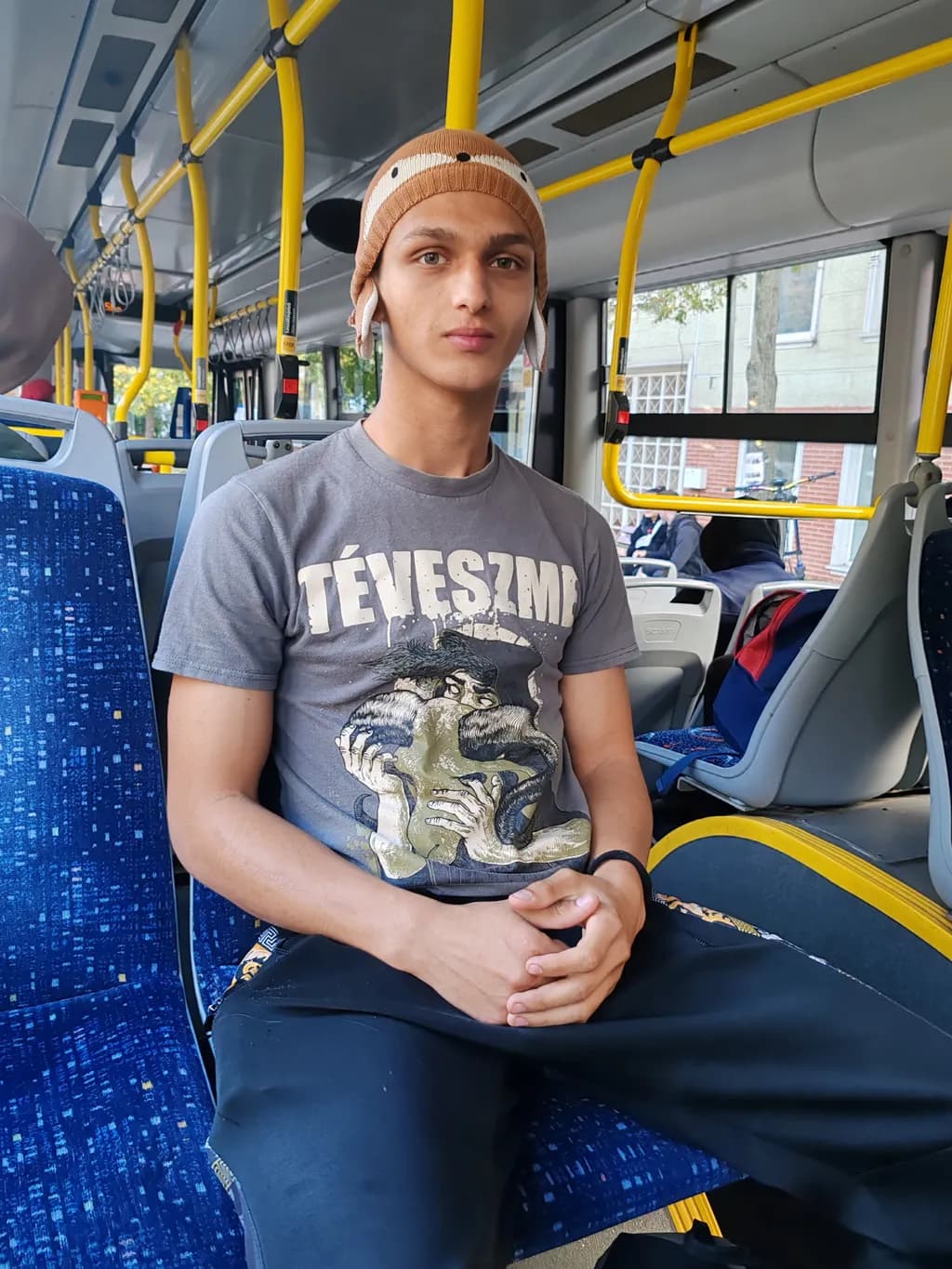 Urban Reflections: A Moment of Stillness on the Bus