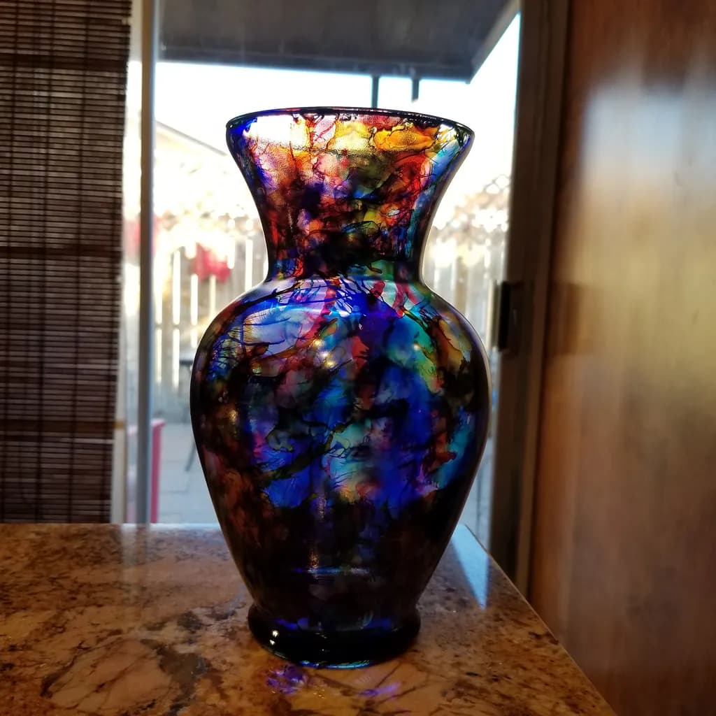 Vibrant Harmony: A Handcrafted Glass Vase of Colorful Elegance