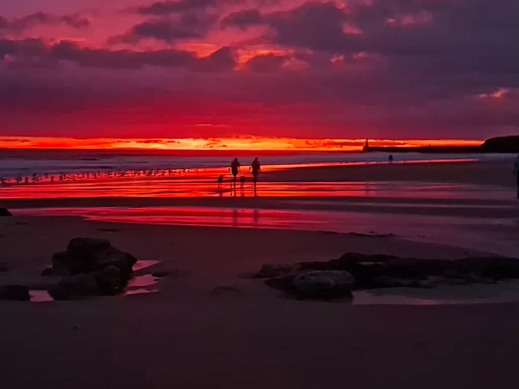 Ethereal Sunset: A Serene Stroll Along the Shoreline at Dusk
