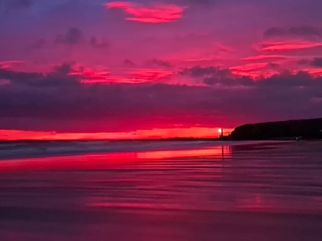 Vibrant Serenity: A Sunset Reflection on the Beach