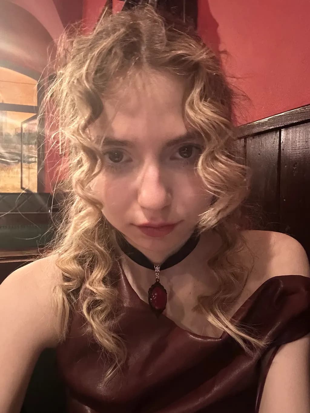 Whispers of Curly Red: A Portrait of Expression and Elegance