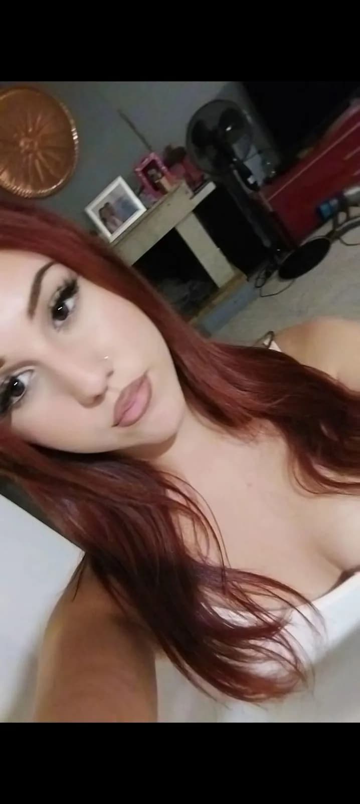 Radiant Redhead: A Casual Indoor Portrait of Beauty