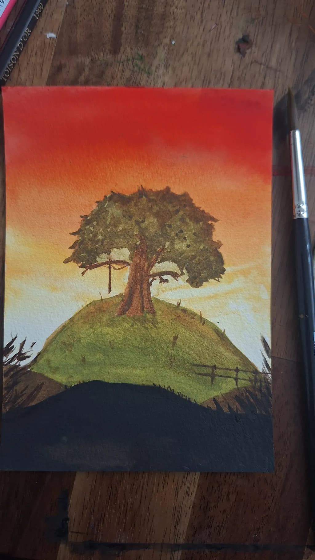 Whispers of the Sunset: A Serene Tree on a Hilltop