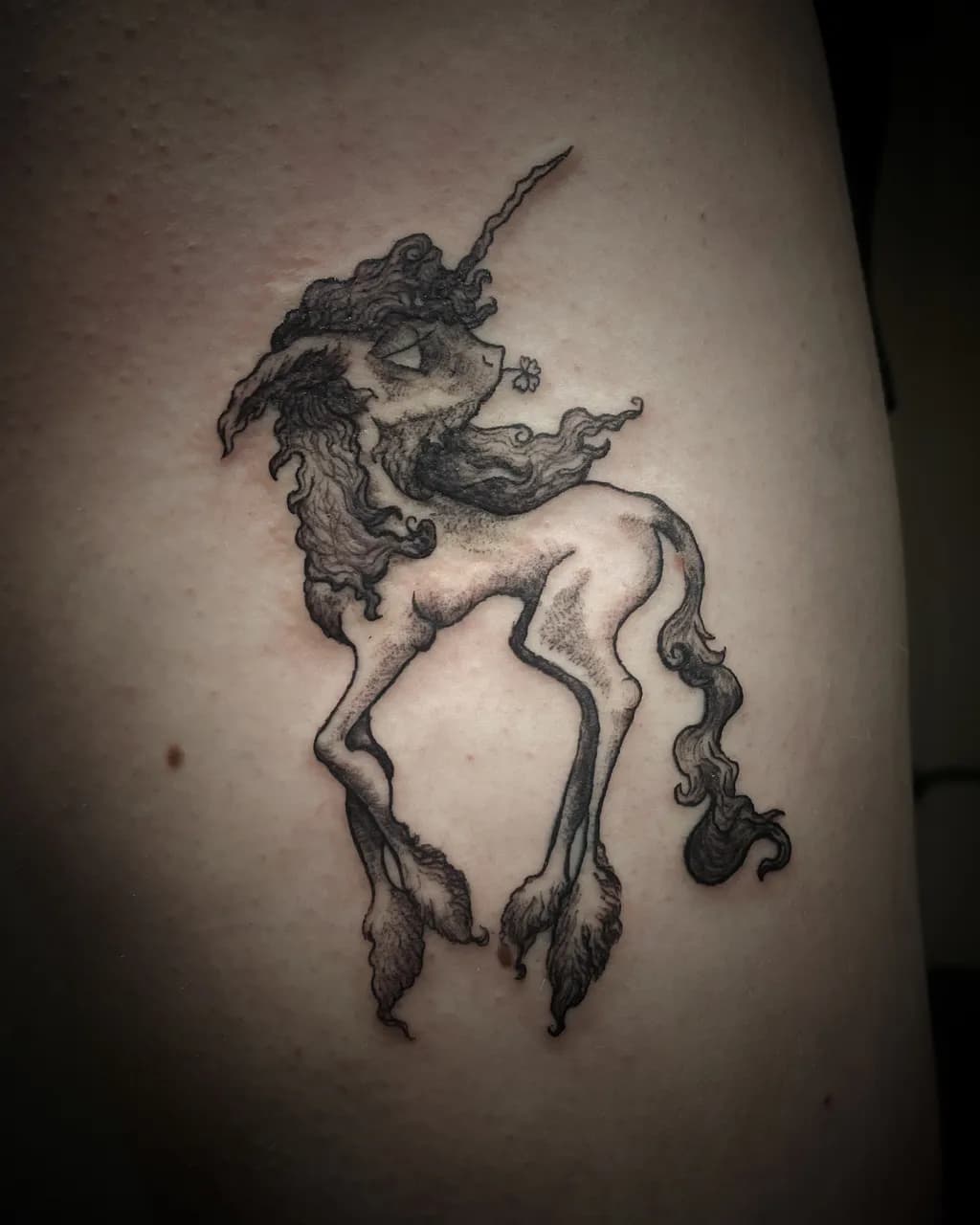 Whimsical Blackwork Unicorn: A Mythical Tattoo Masterpiece