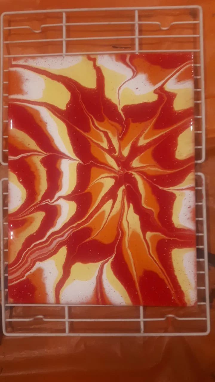 Vibrant Swirls of Passion: An Abstract Dance in Red and Yellow