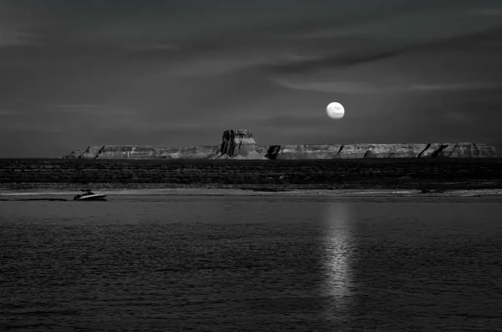 Moonlit Serenity: A Monochrome Reflection on Water's Edge