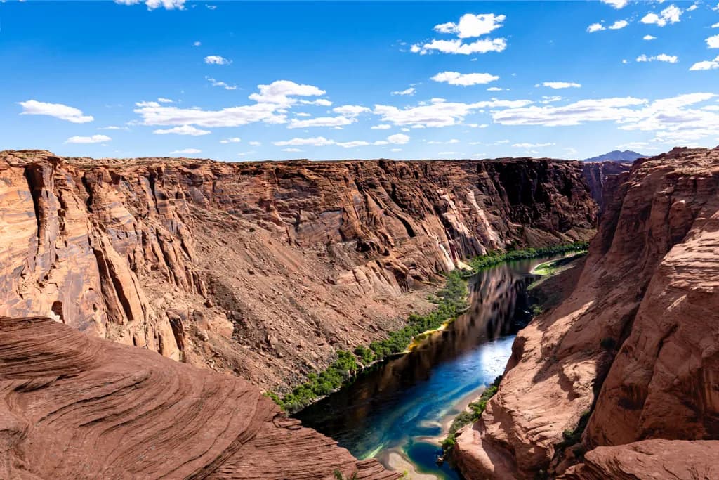 Majestic Serenity: The Timeless Dance of River and Rock in the Grand Canyon Landscape