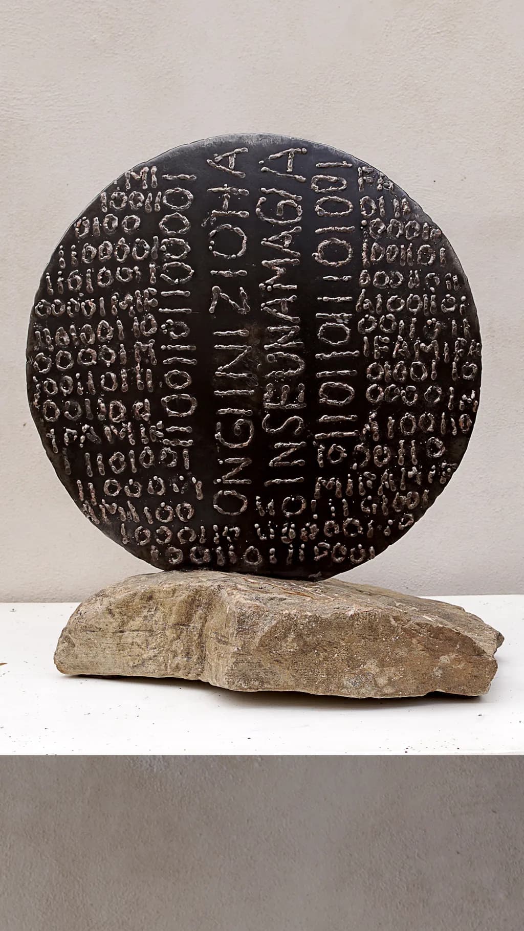 Echoes of Code: A Sculptural Dialogue Between Stone and Binary