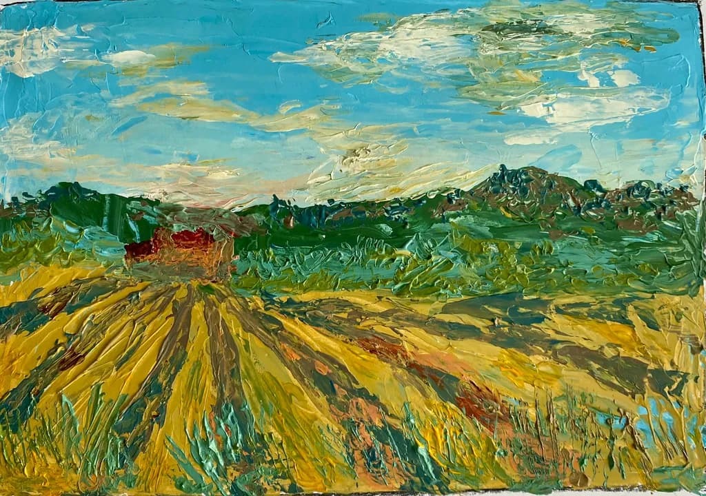 Golden Fields Under a Blue Sky: A Vibrant Landscape in Texture and Color