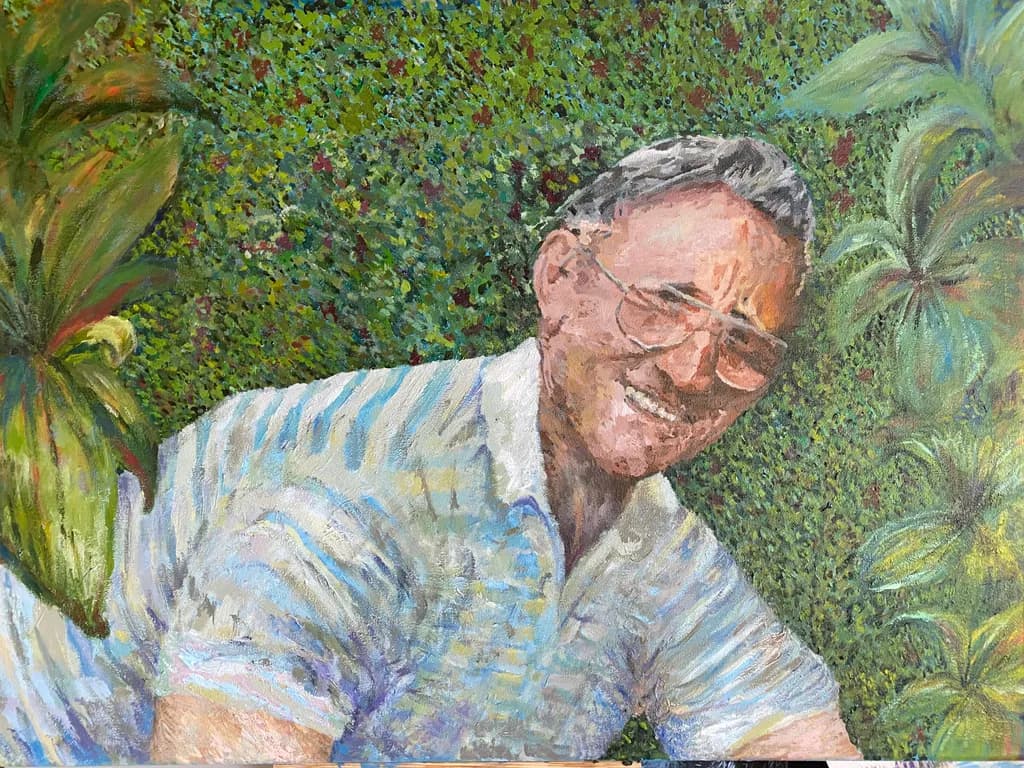 Joyful Embrace of Nature: A Portrait of Smiles and Greenery