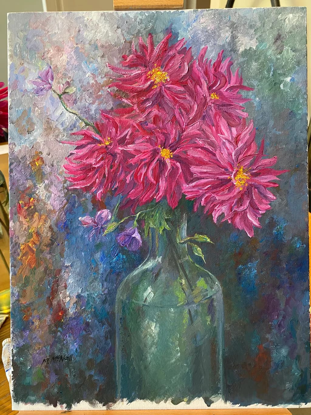 Vibrant Blossoms: A Symphony of Pink Dahlias in Glass Serenity