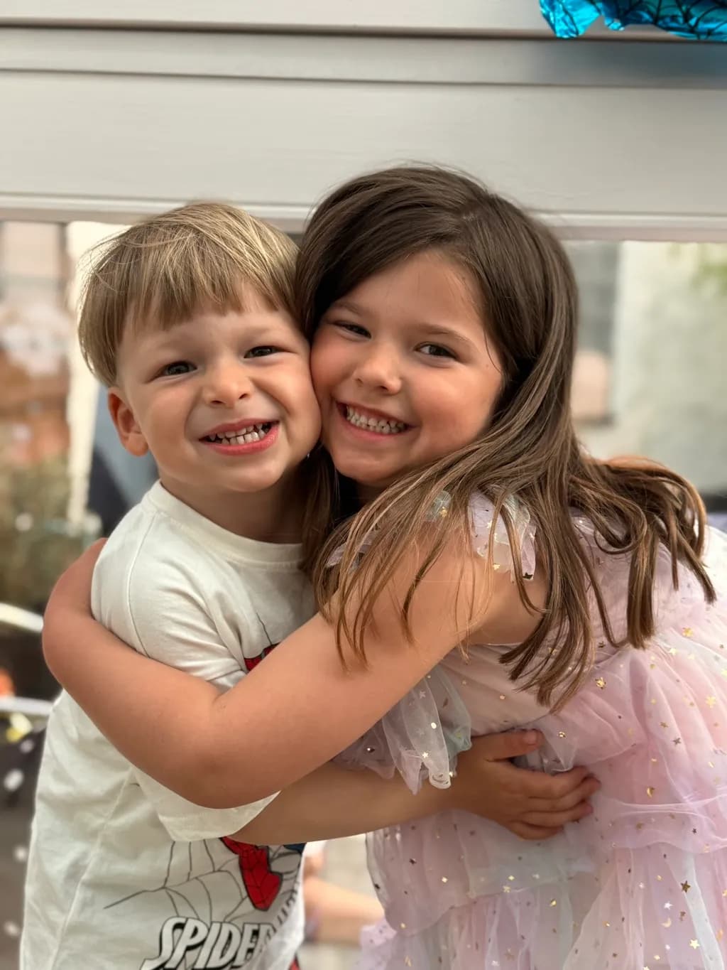Sibling Hug Joy