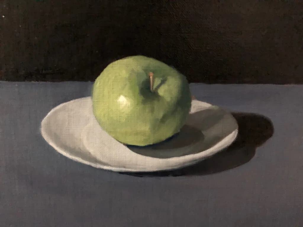 Serene Green: A Still Life of an Apple on a Plate