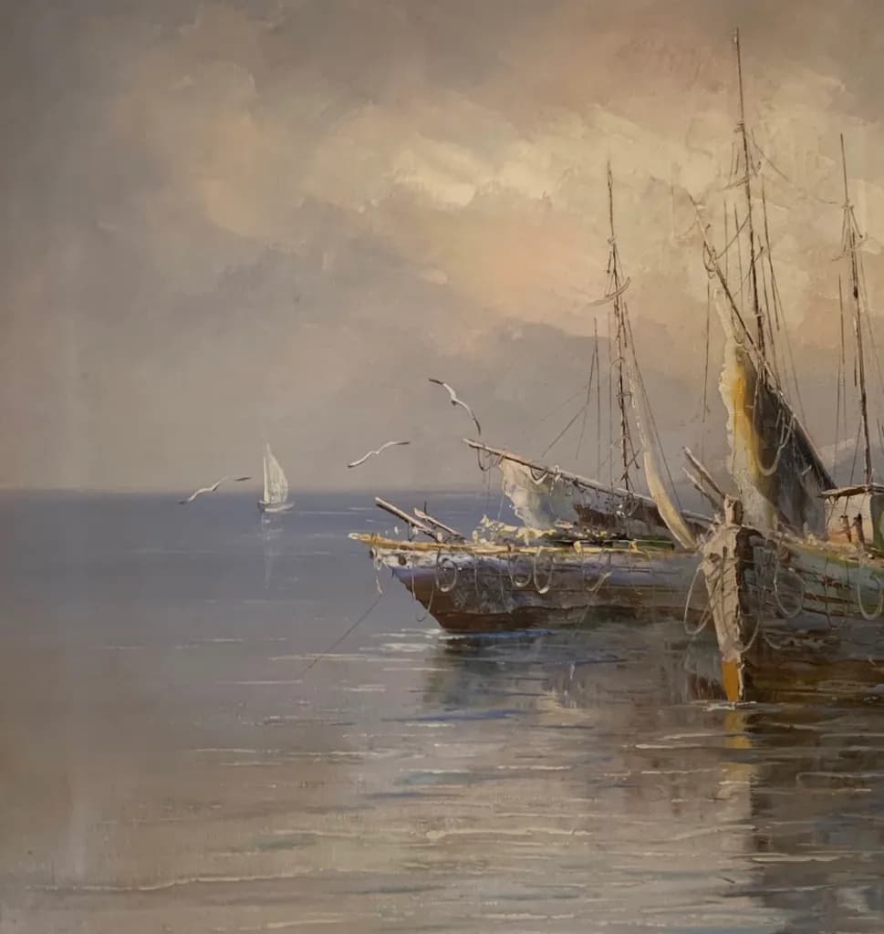 Serenity at Sea: A Tranquil Evening with Fishing Boats and Gentle Waves