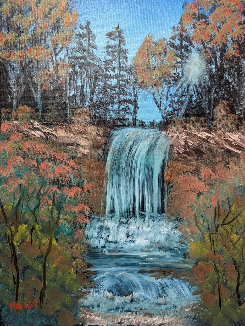 Whispers of Autumn: A Serene Waterfall Landscape in Nature's Embrace