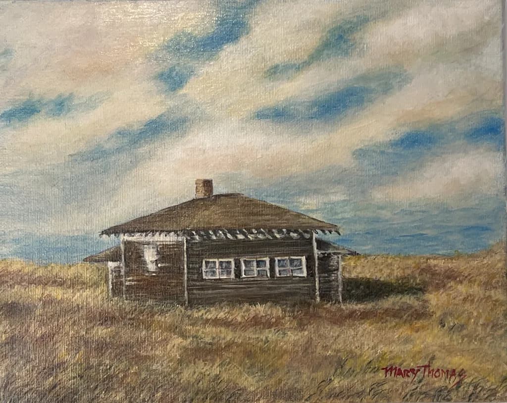 Vintage Weathered School House in a Golden Field