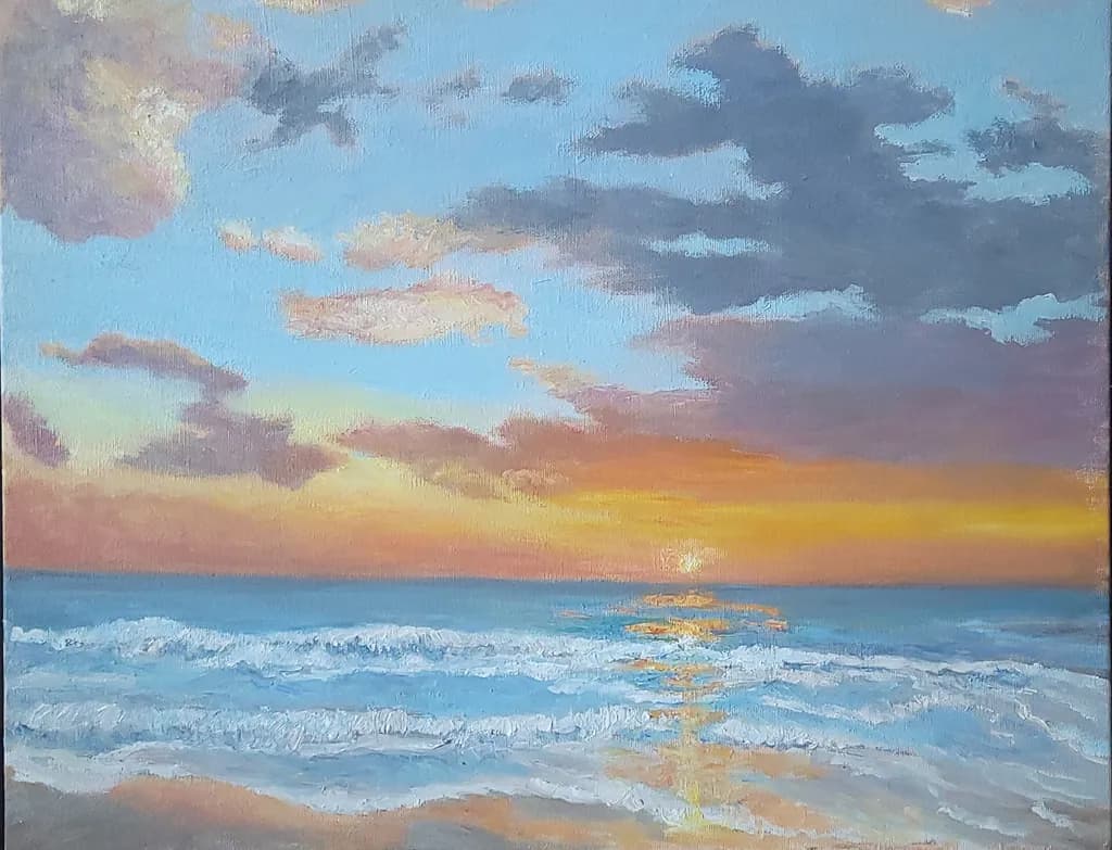 Sunset Over Ocean Waves