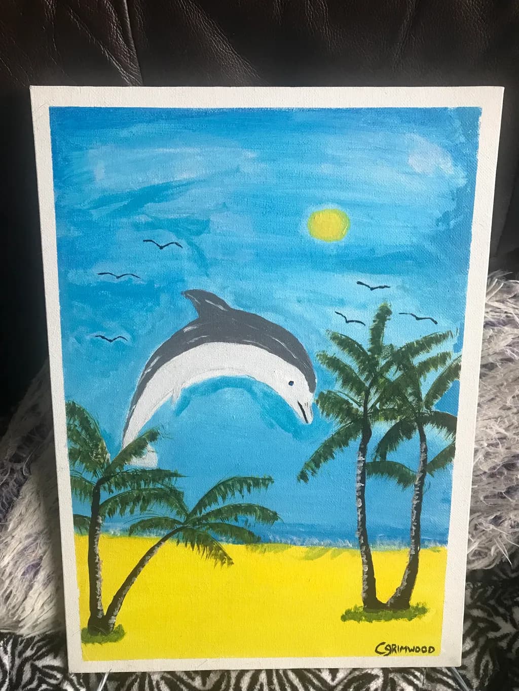 Dolphin Over Beach