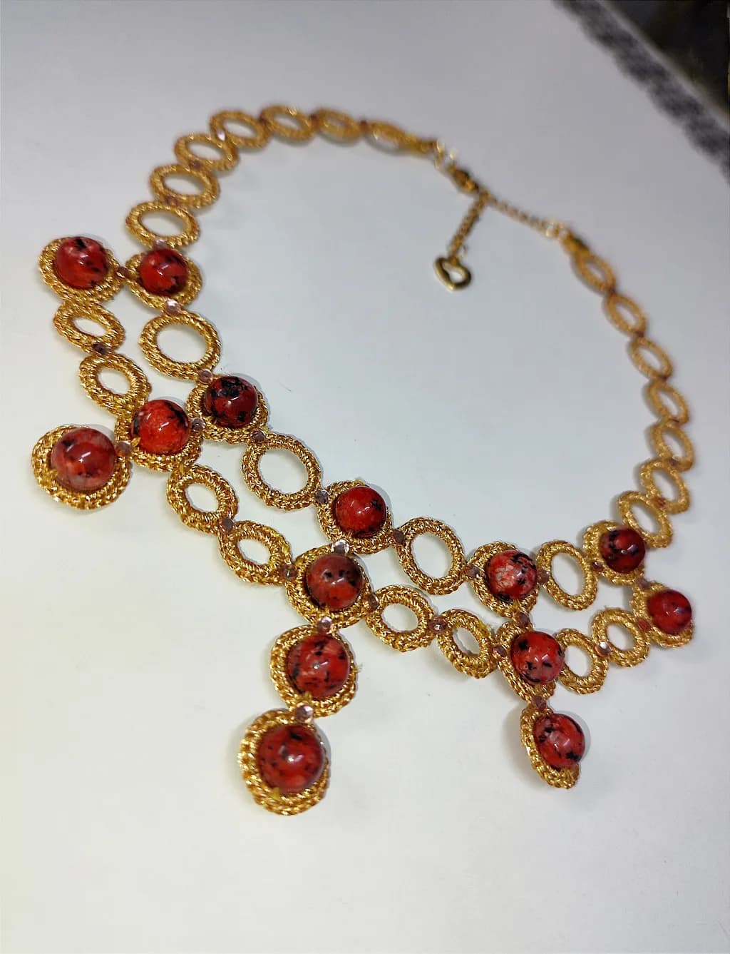 Golden Loops with Red Stones