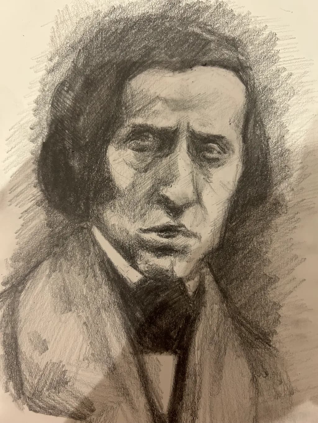 Contemplative Charcoal Portrait