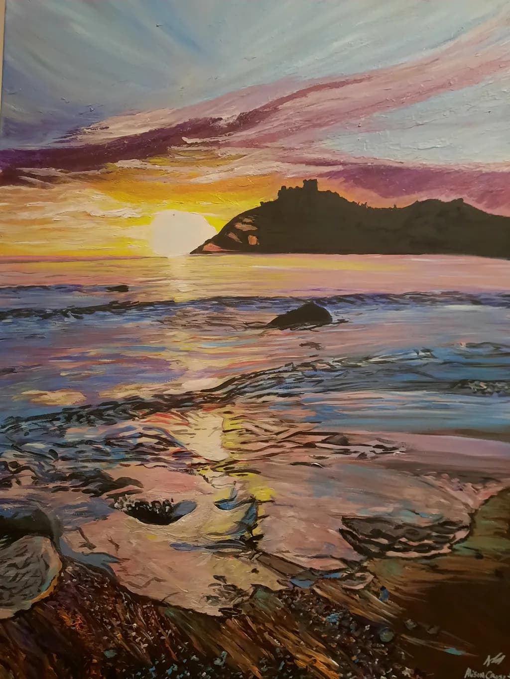 Sunset shinning on Criccieth castle and sea