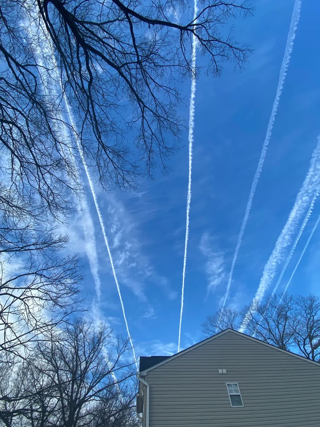 Sky Trails Above Roofline