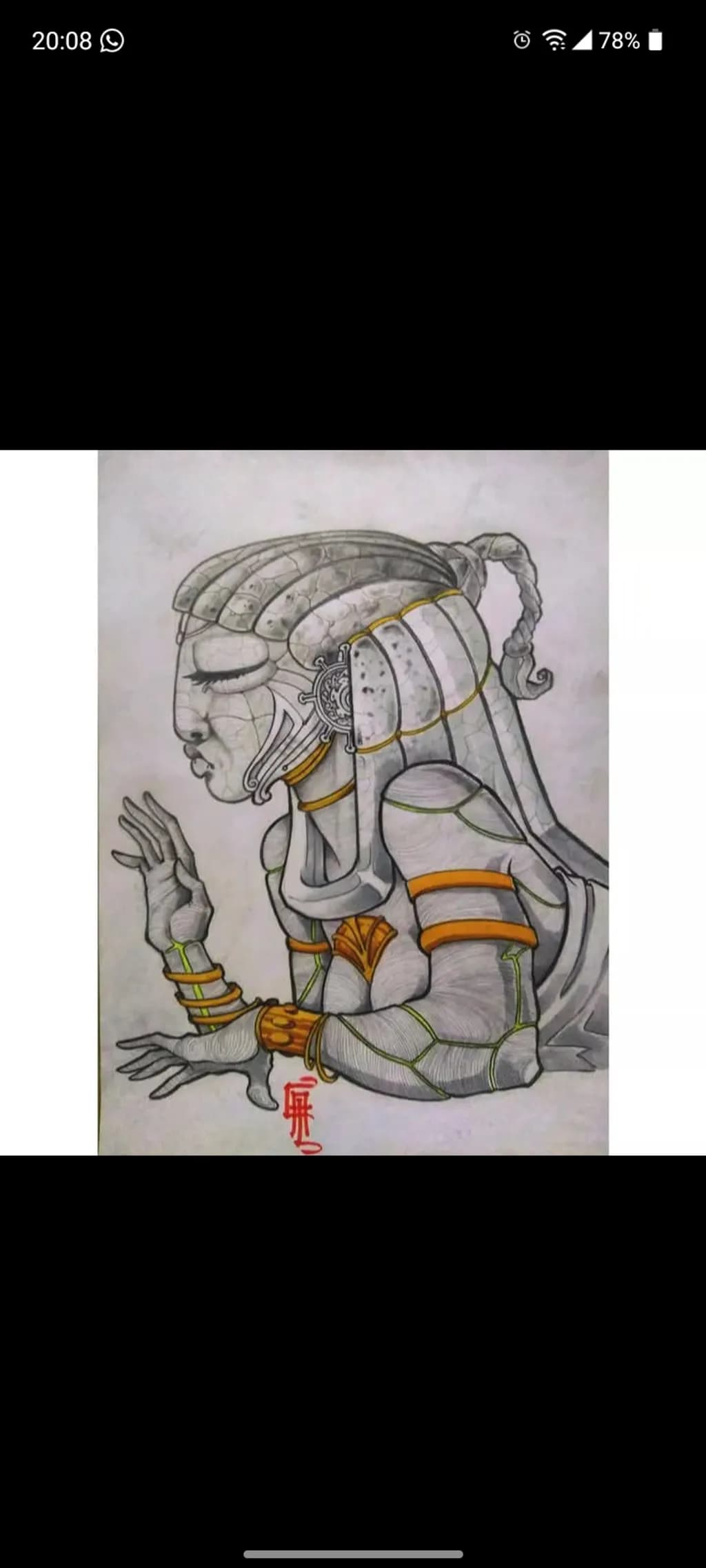 Ornate Seated Figure