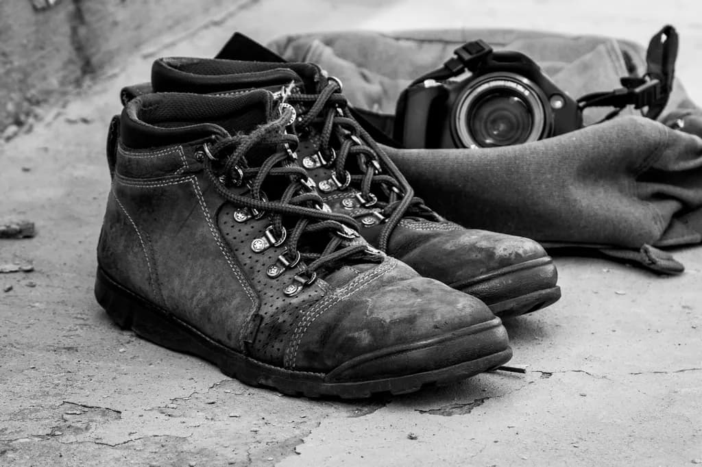 Worn Boots and Camera