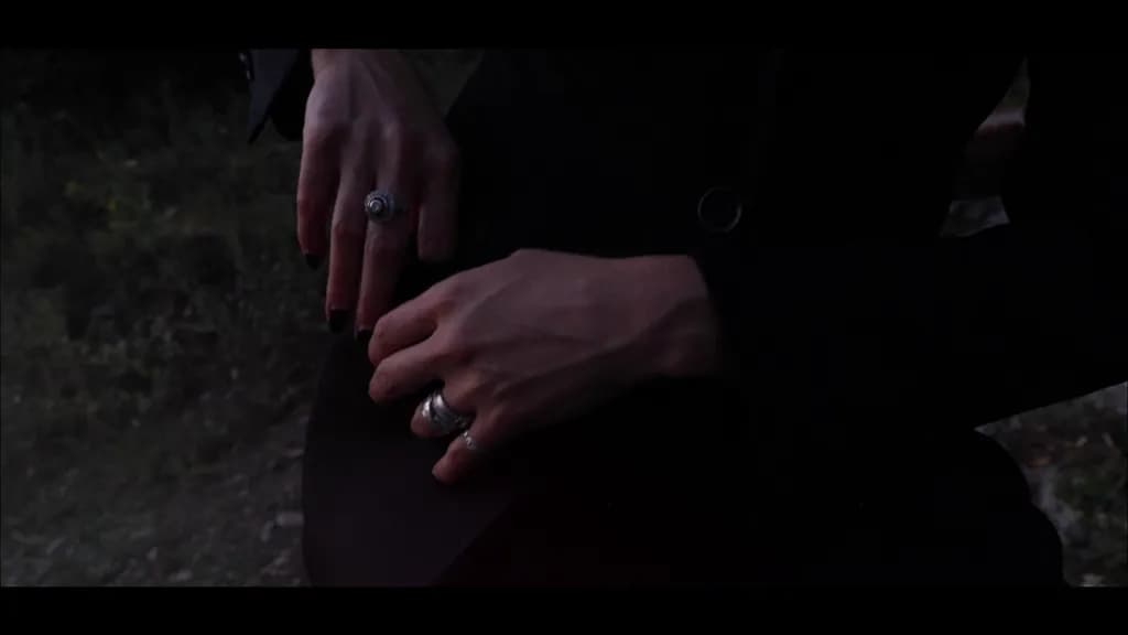 What’s in your pocket, shadowed hands?