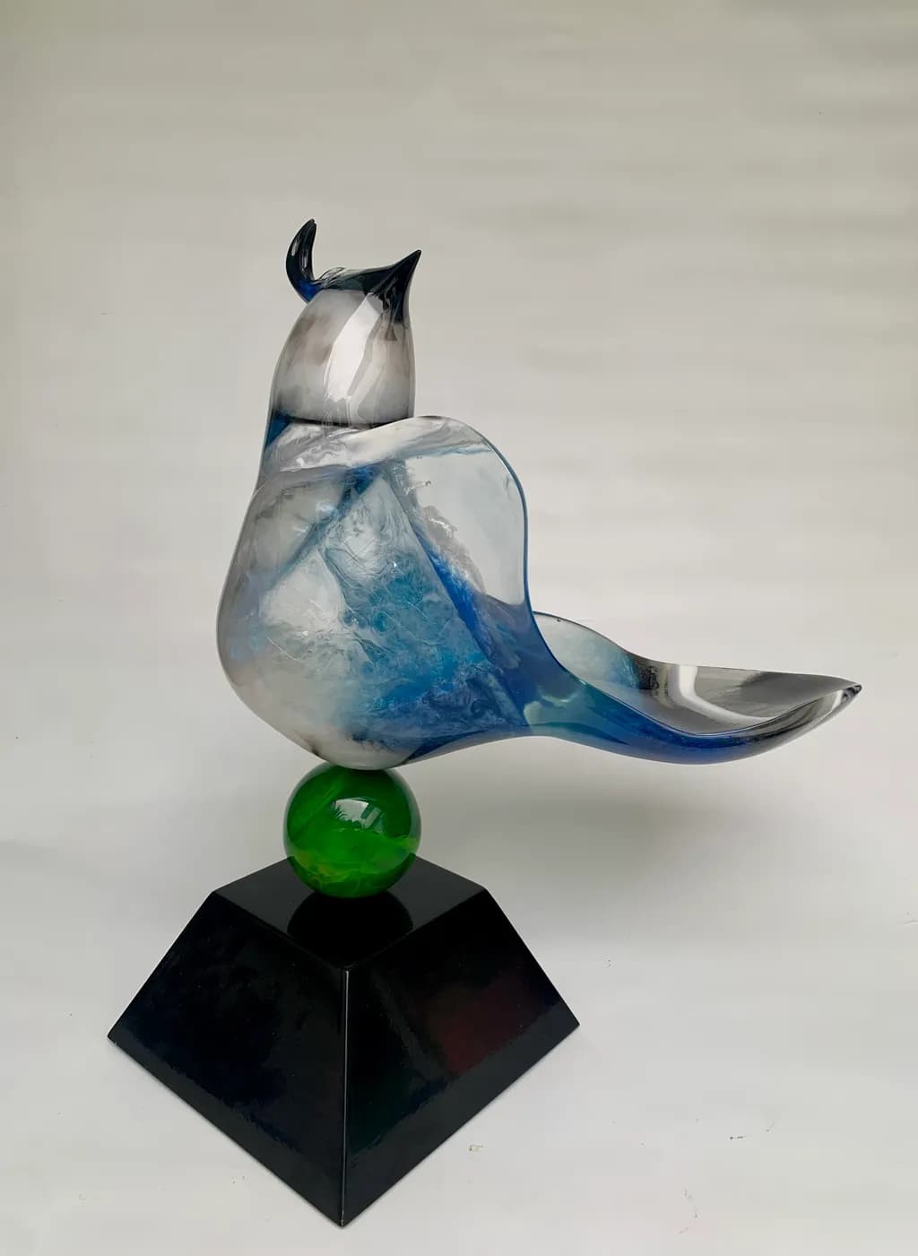 Blue Glass Bird on Green Sphere