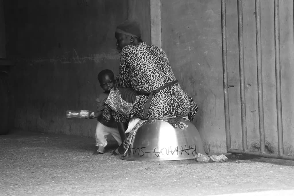 Kayaye Head Porter and Child