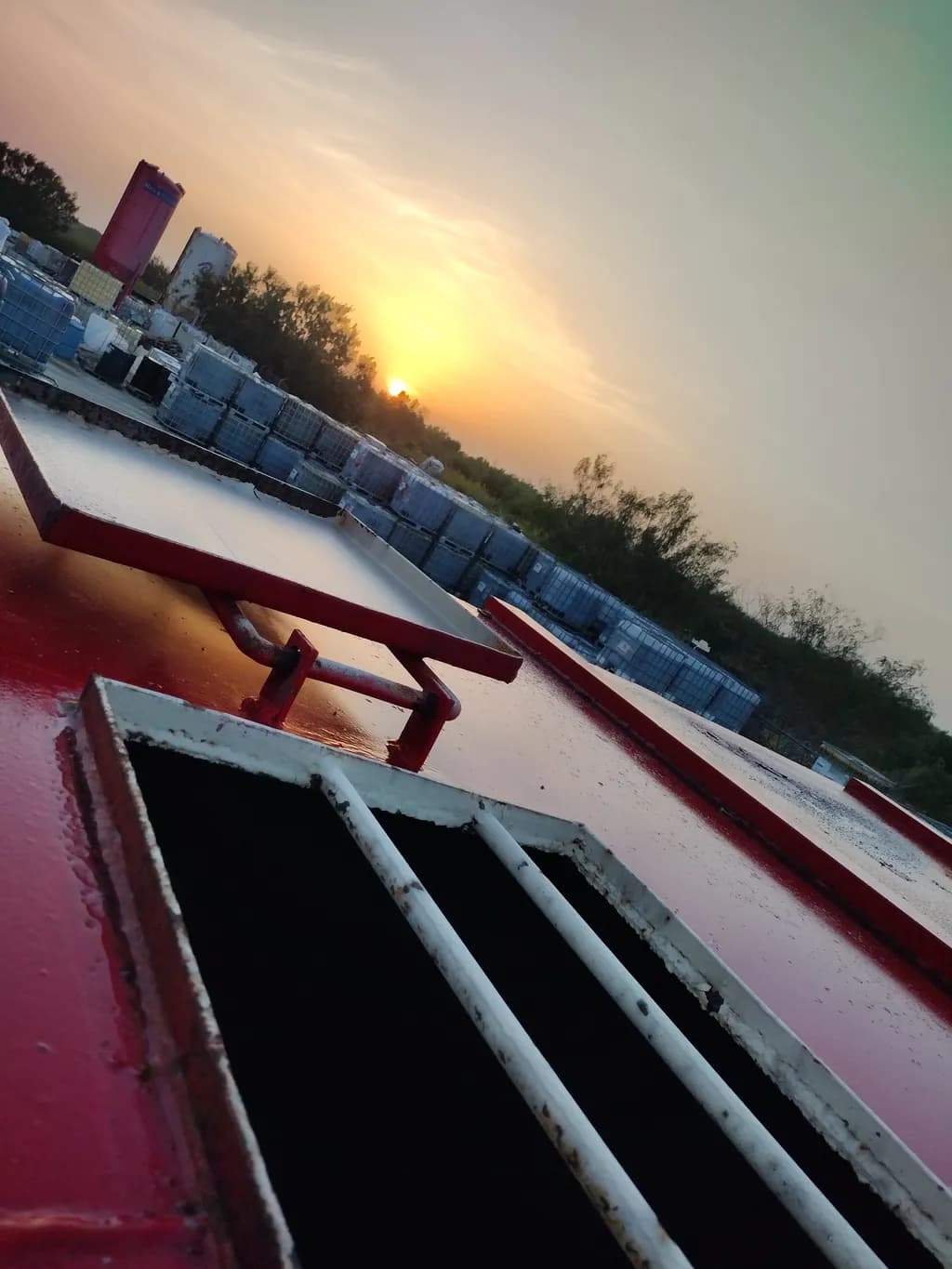 Sunset Over Industrial Yard