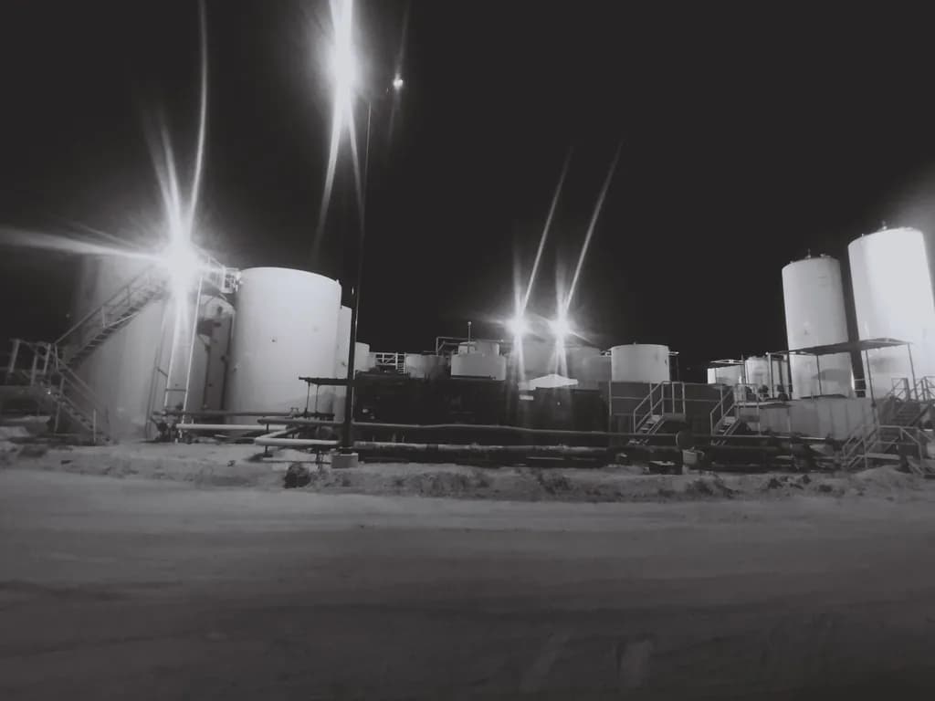 Industrial Storage Tanks at Night