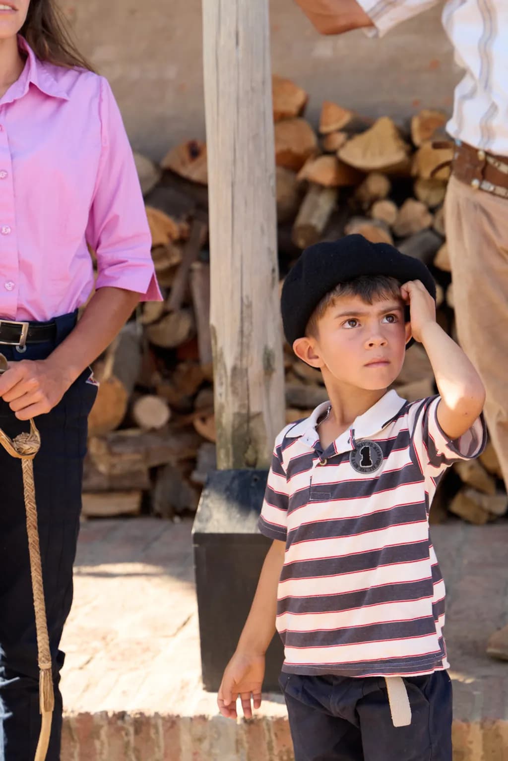 Thoughtful Boy by Firewood
