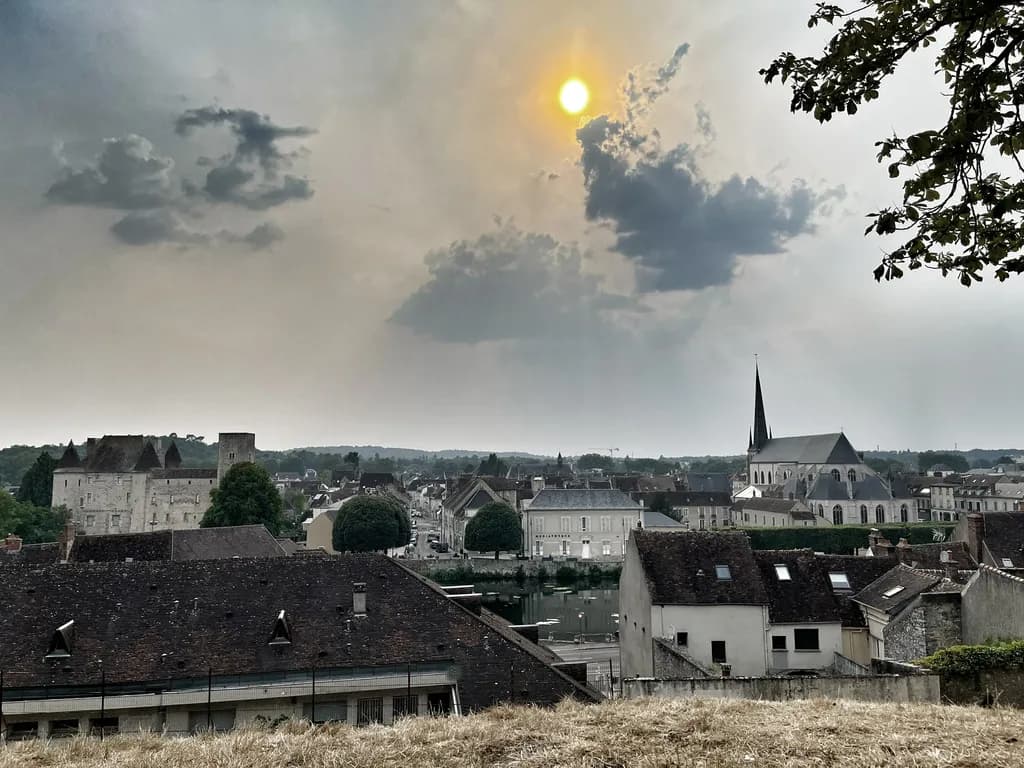 Sunset in Nemours, France amid a wildfire