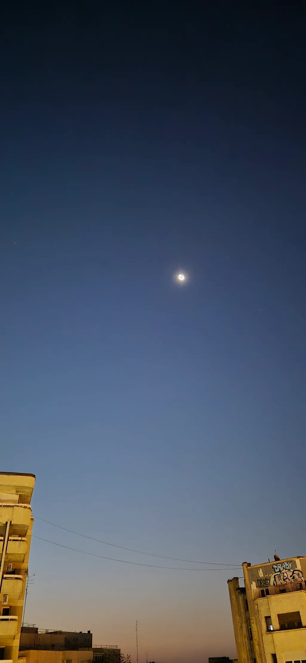Moon Over Rooftops