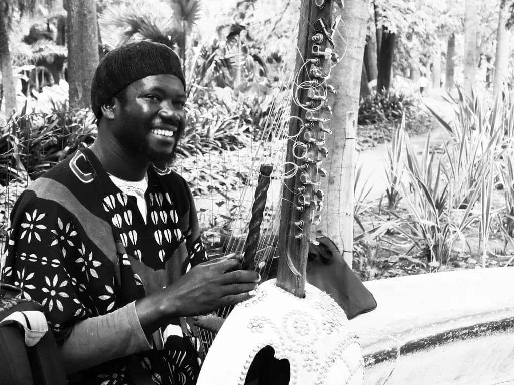 Smiling While Playing Kora