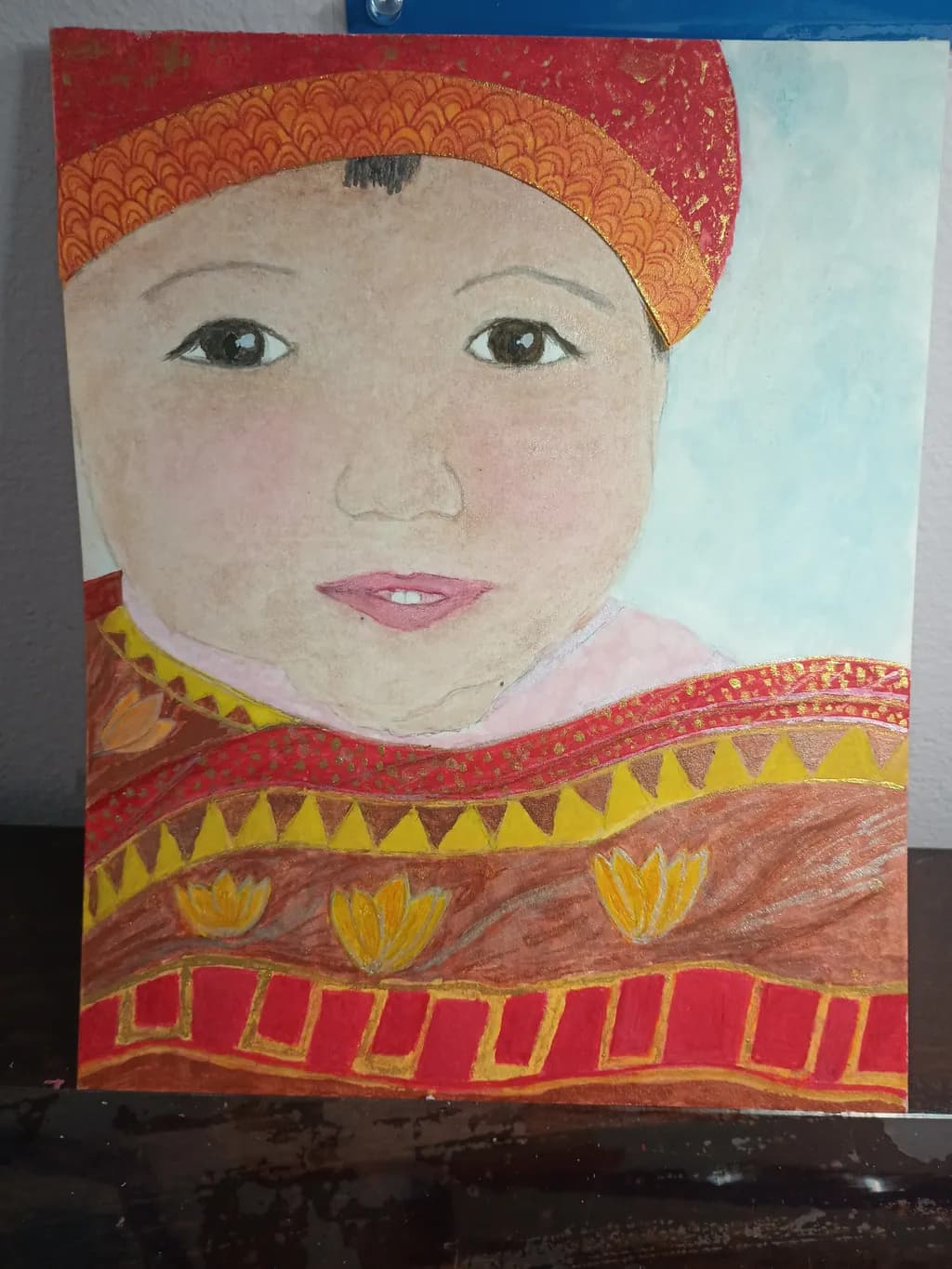 Child in Patterned Wrap