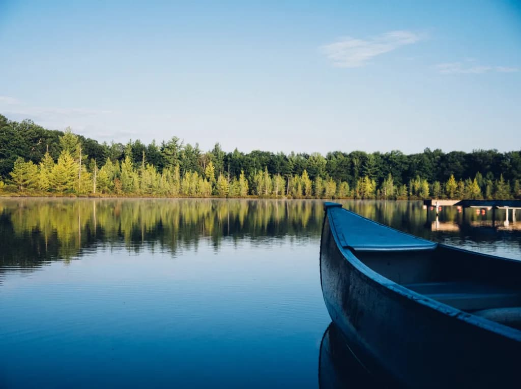 Calm Canoe Reflection