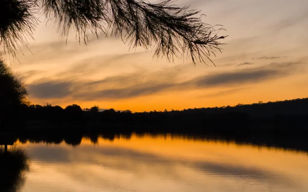 Sunset Reflection Over Lake