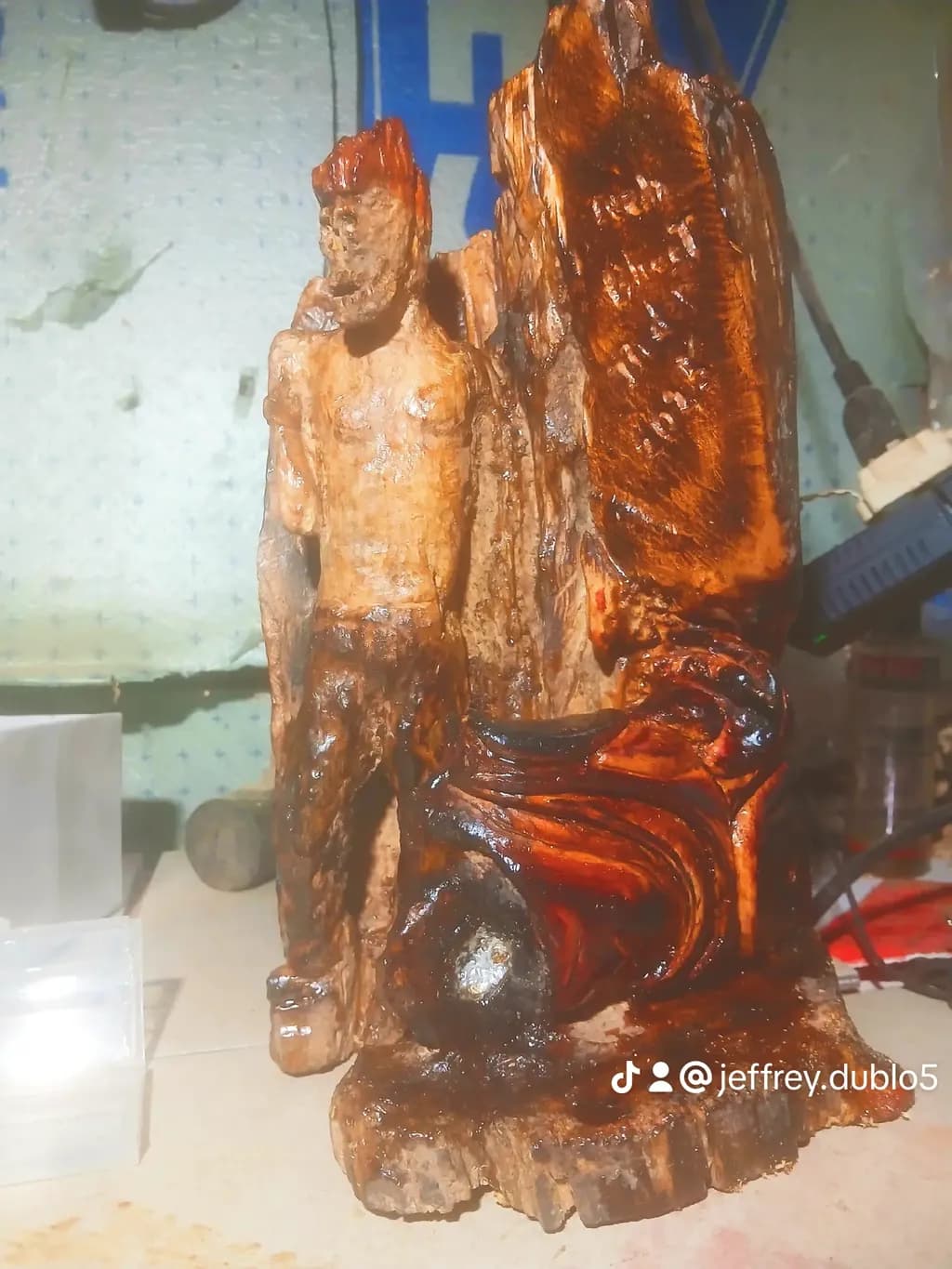 Man and Rooster Sculpture
