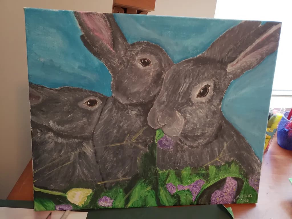 Three Rabbits Among Flowers
