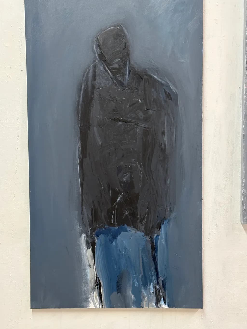 Dark Figure with Blue Jeans